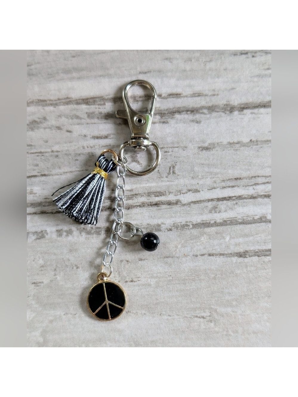 Black and Gold Peace Sign Bag Charm